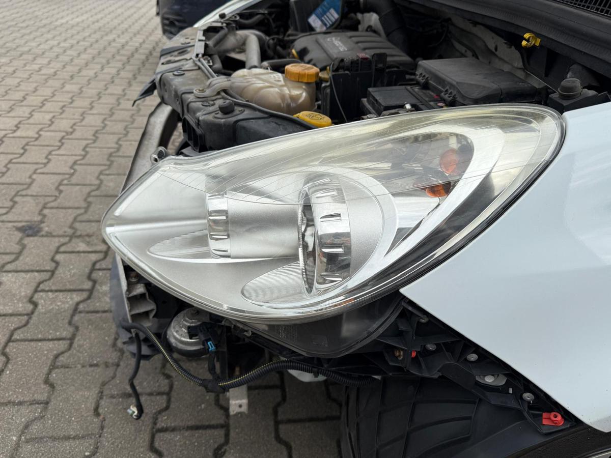 Opel Corsa D original Scheinwerfer links Halogen Vorfacelift BJ10